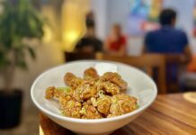 Disfruta de la galardonada cocina cantonesa en Canto Pollo a la naranja en Canto. Foto de Oscar Almeida.