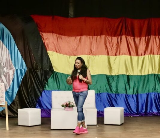 Fortalecer las redes comunitarias: Te cuido, me cuido 2024, una nueva iniciativa gratuita de salud y bienestar Activist Kenya Cuevas at conference for Vallarta Pride 2024 by photographer Oscar Almeida