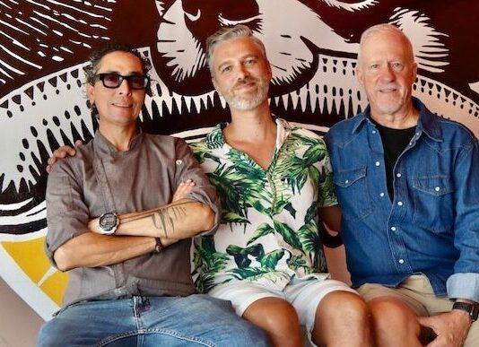 Salchidogo Ofrece Sabores Únicos en el Nuevo Lugar de Hotdogs de Puerto Vallarta (left to right) Juan Sebastian Palafox, Brian Scott Carey, and Philip Wier, owners of the new restaurant Salchidog. Photo by Oscar Almeida.